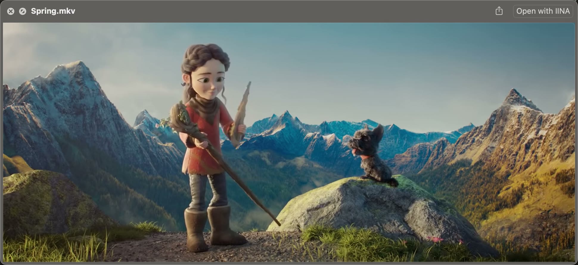 Finder’s Quick Look window playing Spring.mkv: a young shepherd girl and her dog in front of mountains.